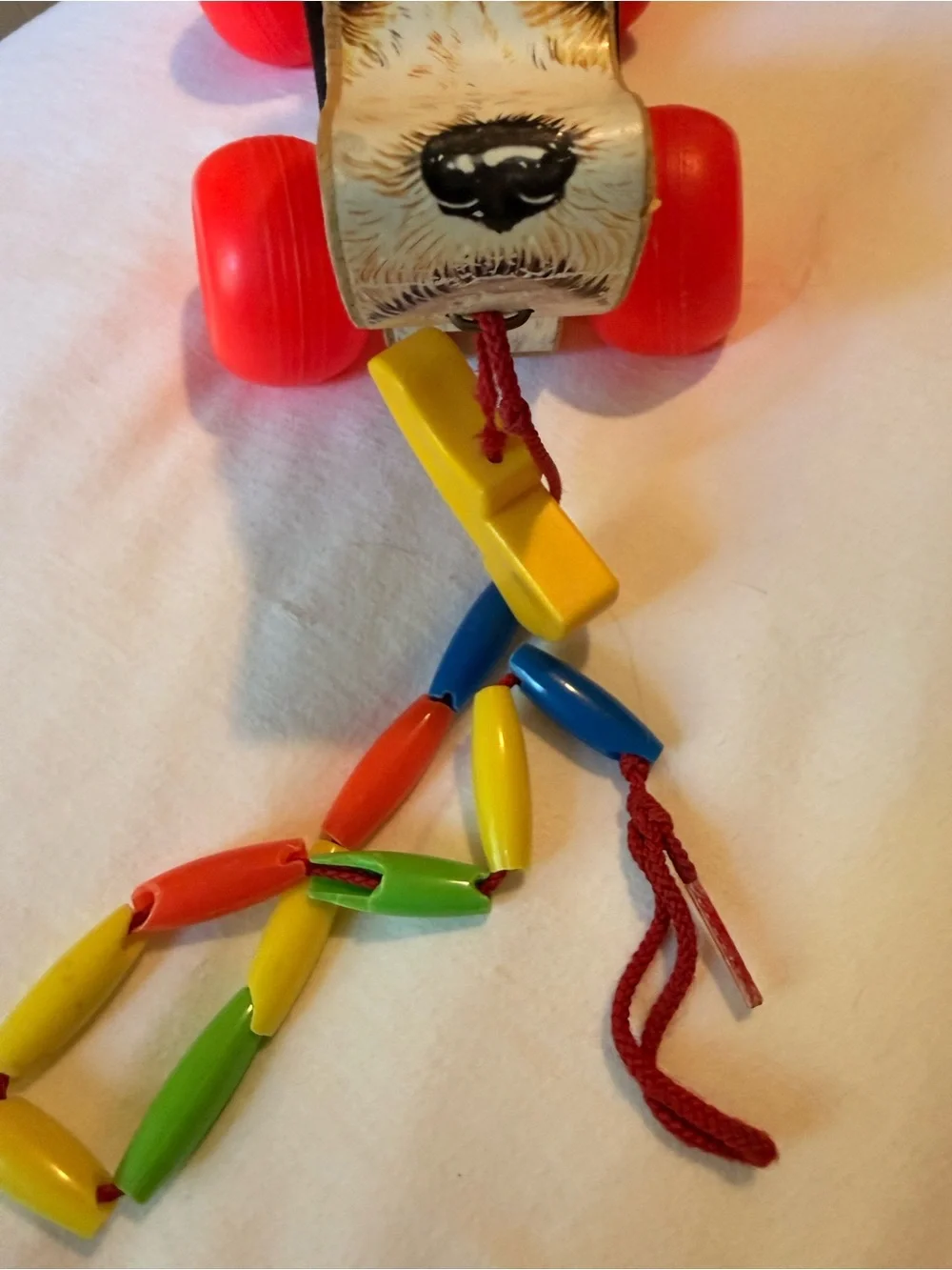 Vintage Wooden Pull-Along Dog Toy in Brown with Red Wheels 1968